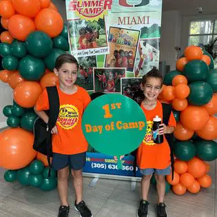 Children enjoying summer camp activities at the University of Miami campus