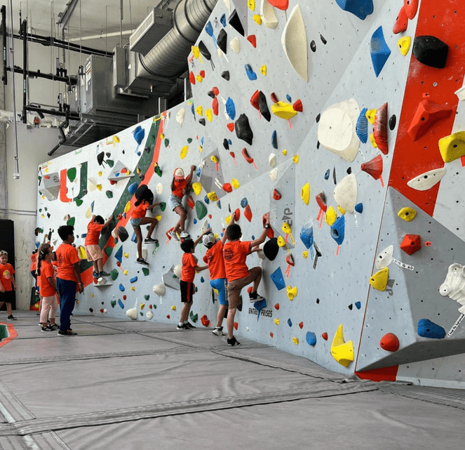 Kids staying active all day at Miami summer camp with structured activities and teamwork.