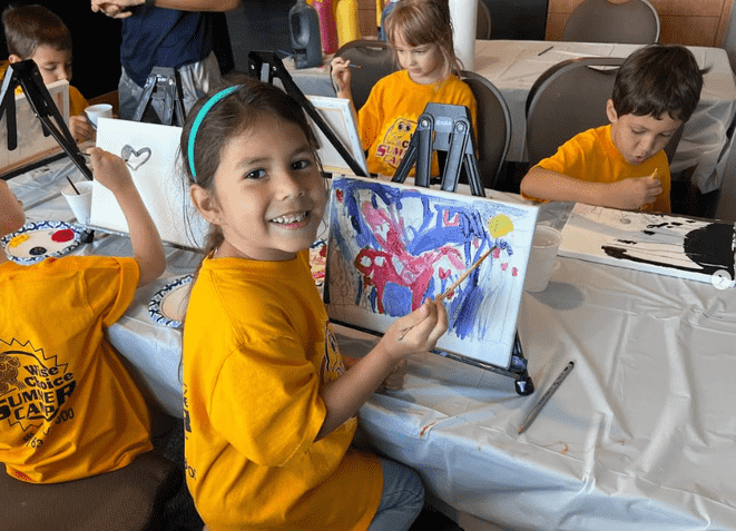 Kids enjoying extended summer camp sessions in Miami, building friendships and confidence