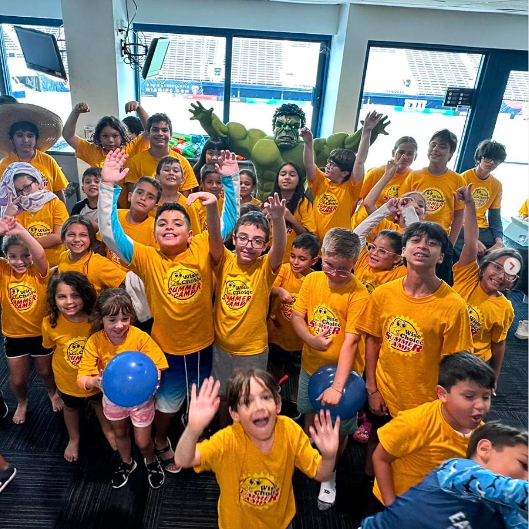 Kids enjoying theme day activities at Miami summer camp