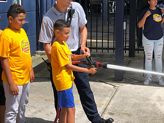 Campers-Hosing-Down-Cones